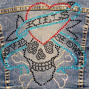 GO Jean crop jacket with black, red, blue &white skull sparkle